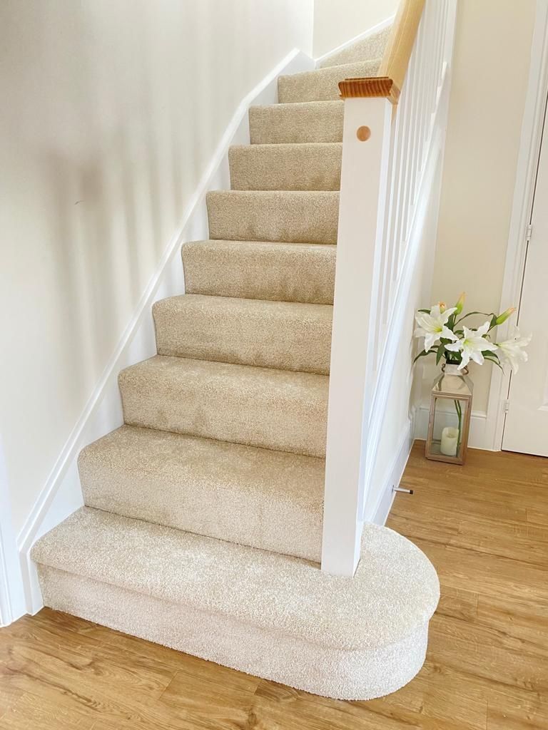 Carpeted staircase installation